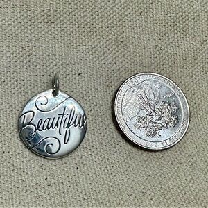 Brand new RETIRED Beautiful charm.